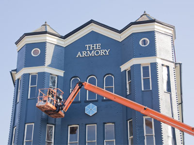 That crane is right over the main entrance, so employees and clients have to walk awkwardly under it. That crane is right over the main entrance, so employees and clients have to walk awkwardly under it.
