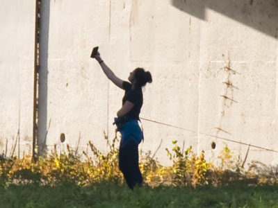 She was being photographed twice at the same time. She was being photographed twice at the same time.