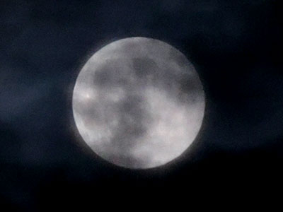 Supermoon on a cloudy night. Supermoon on a cloudy night.