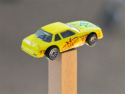 The point of the game is to knock the car down.