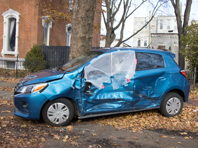 Looks familiar: a parked car was hit by a bad driver and smashed into a tree (see October 17, 2022).
