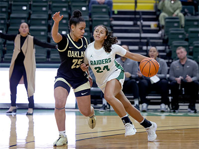 Look at the number of people in the stands.  This is why I can sit at courtside and get good photos.
