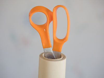 Over 30 years ago, I put down shelf paper in the kitchen.  Today I added more, using the same scissors and roll.