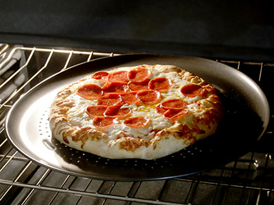 I cleaned the oven, then tested to make sure it worked.