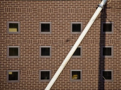 A line segment joining two non-adjacent vertices of a polygon, acting as a slanting connector within a shape.