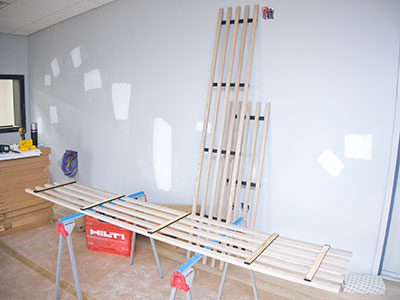 Those are sections of a musical staff that will hang from the ceiling.