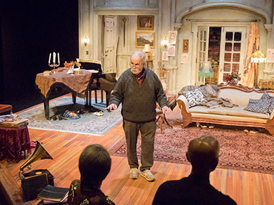 I was on a tour of the set of `Hay Fever` at the Loft Theatre when director Bob Hetherington greeted us.