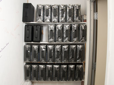 The CDs are being stored in many, many binders.