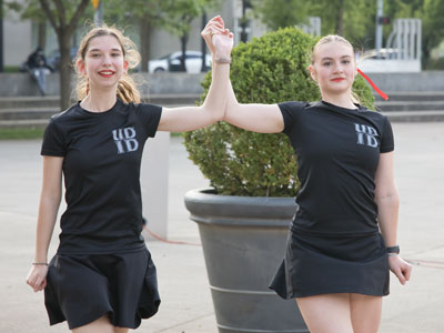 Dancing outside the baseball stadium.